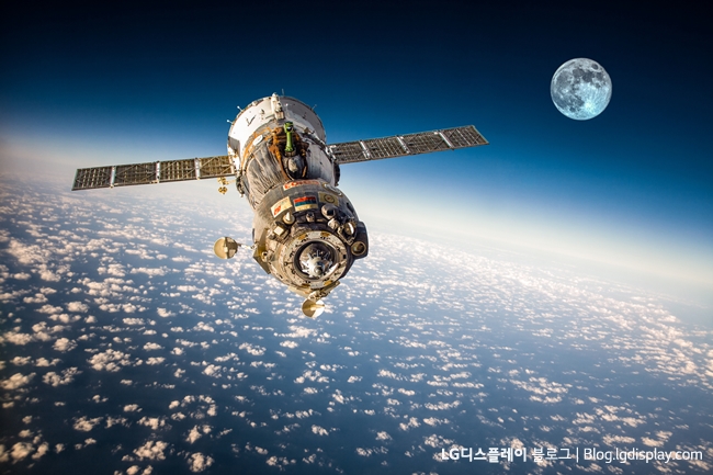 Spacecraft Soyuz orbiting the earth. Elements of this image furnished by NASA.