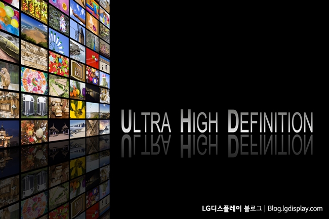 Concept of Ultra High Definition TV on black background with reflection